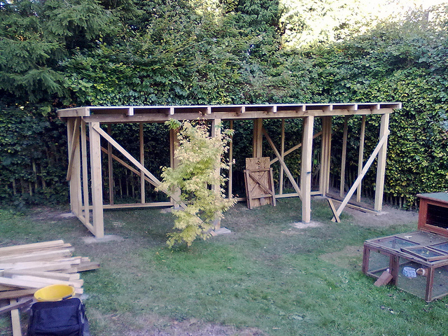 Diagonal bracing ties the structure together and then the roof joists can go on.